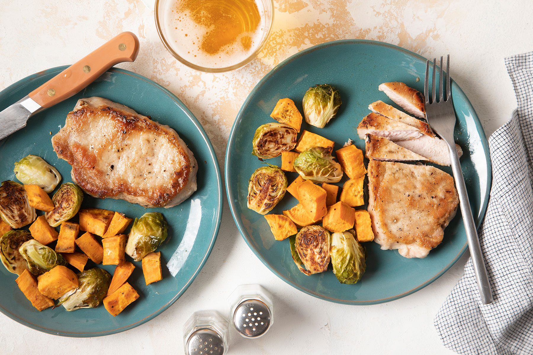 Pan Fried Pork Chops with Seasonings and a Beverage