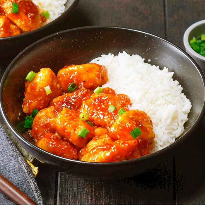 bowl with sesame chicken and rice