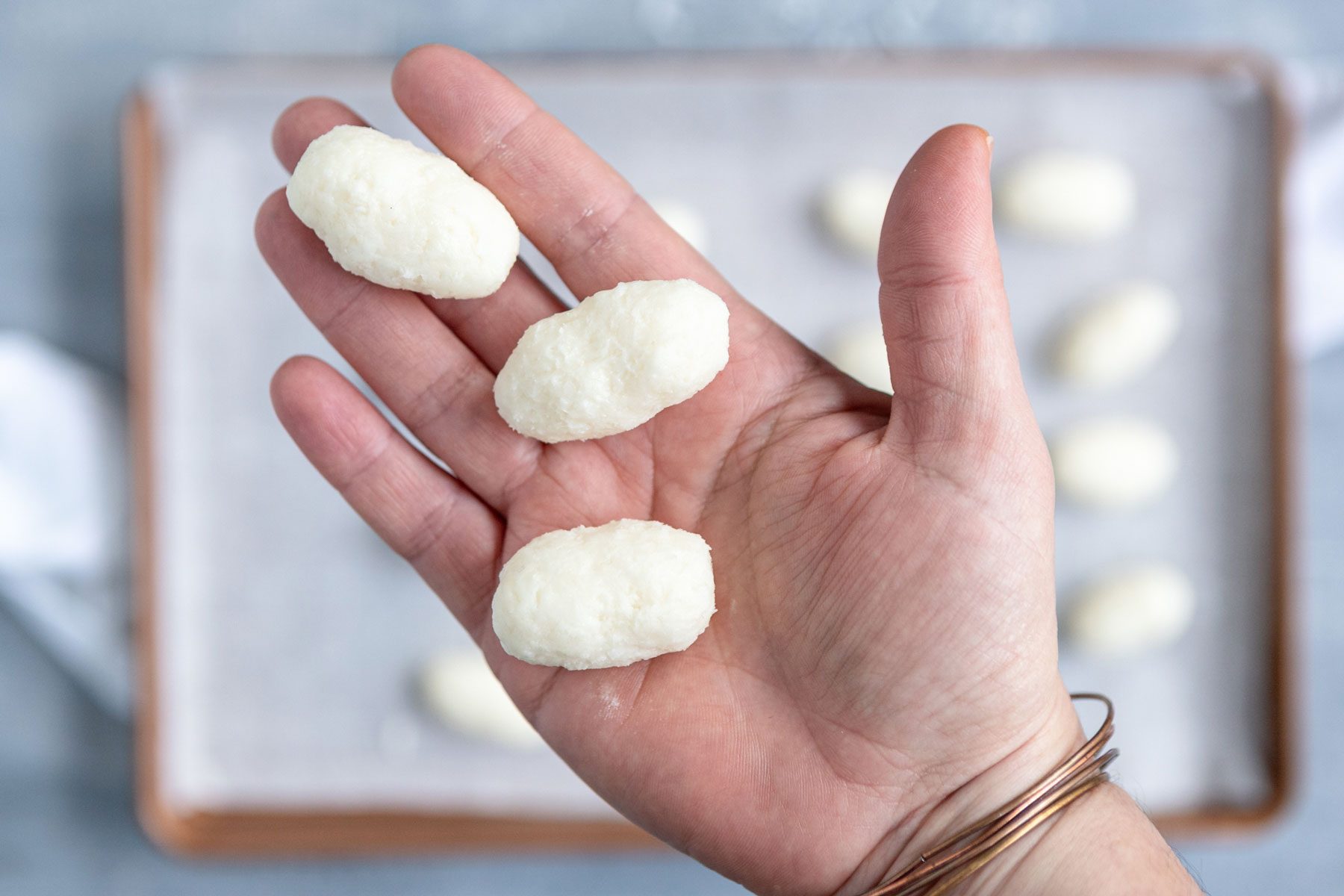 Rolled up mixture of cream cheese and coconut