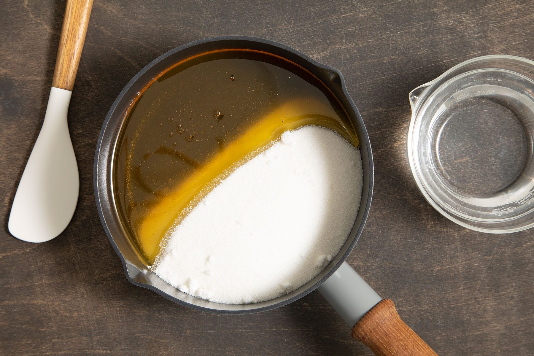 Sugar and honey in sauce pan