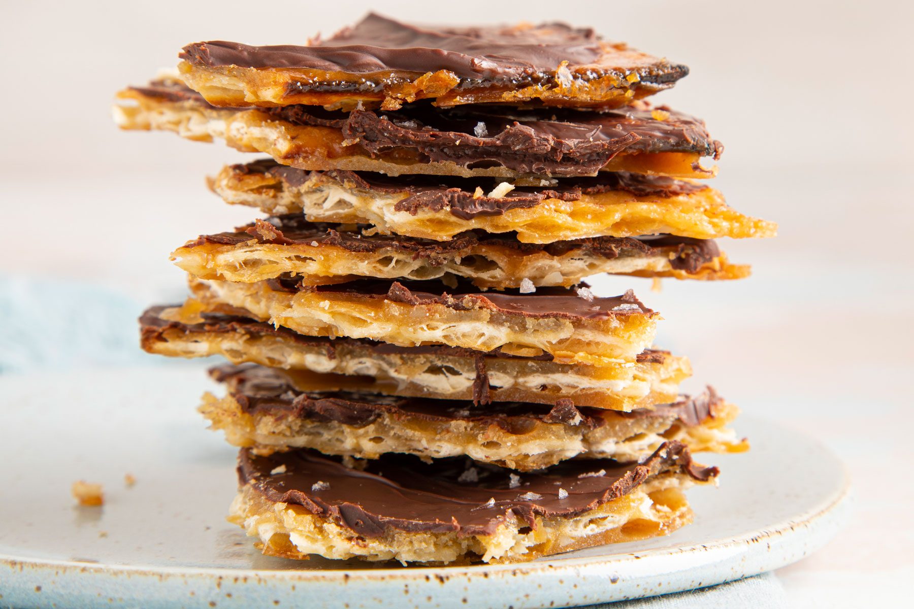 Chocolate Covered Matzo on a white plate