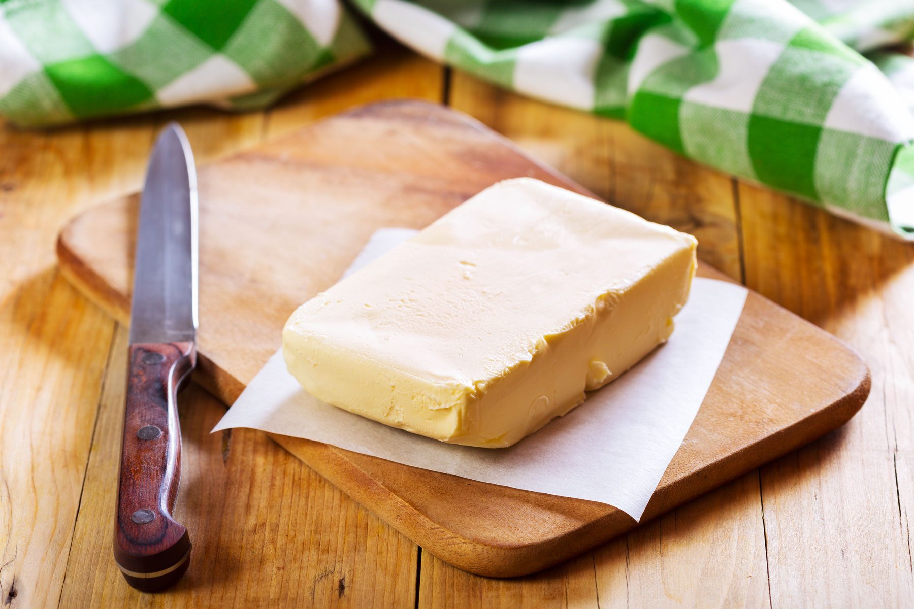 Margarine butter on a wooden table