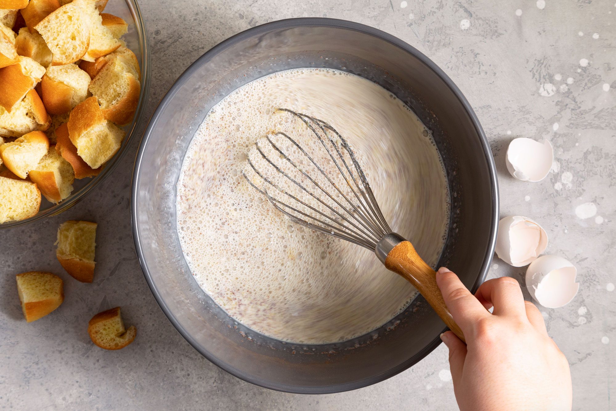 Mixing Egg and Milk in a Large Bowl