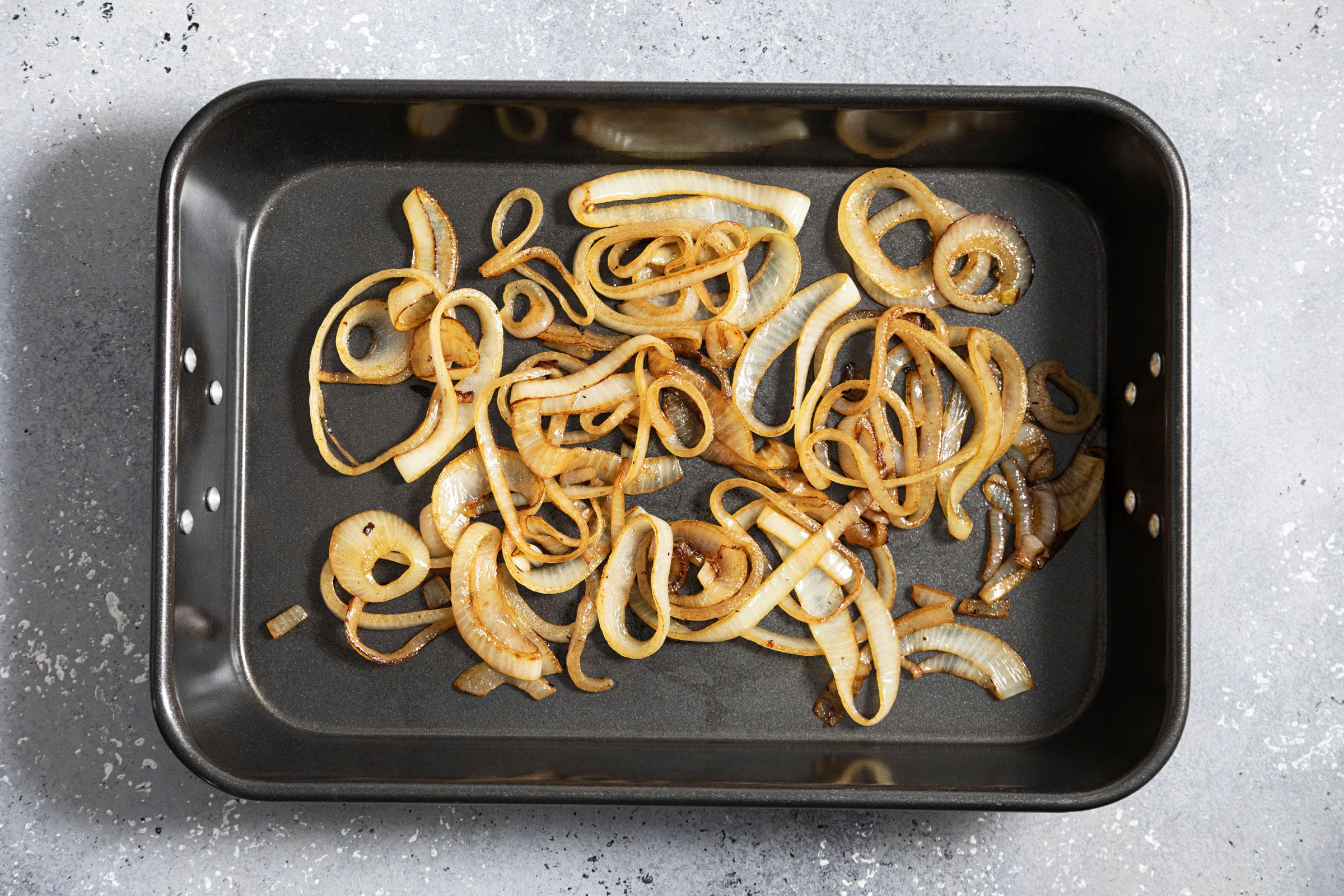 sautéd onions in a baking pan