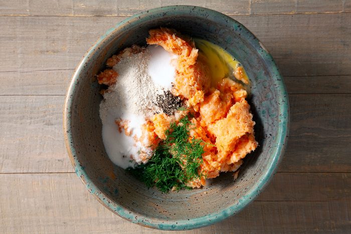 Egg, dill, lemon juice and mixture combined in a large bowl