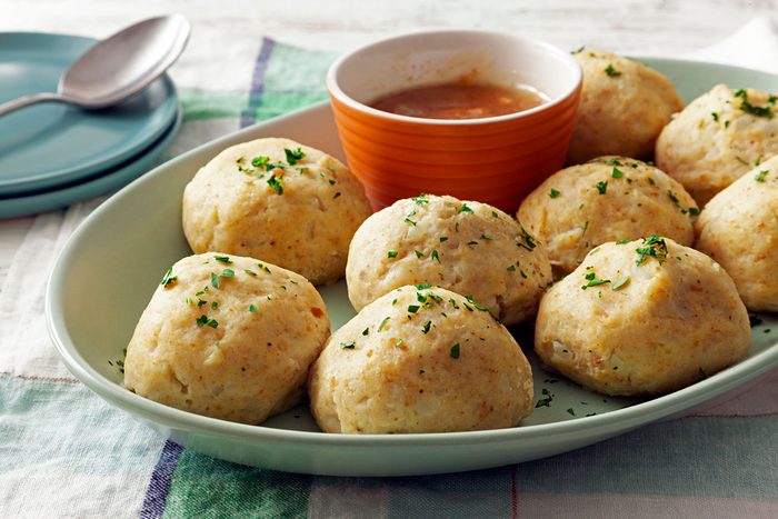 German Potato served in a long plate with sauce