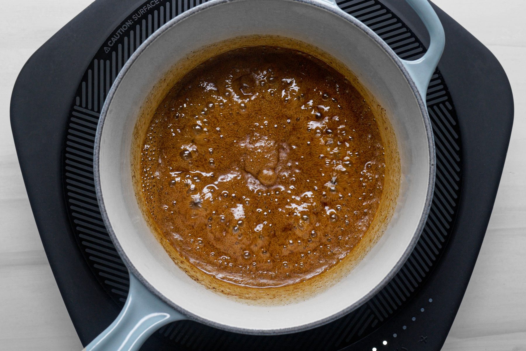 Maple Glazed being cooked in a large sauce pan
