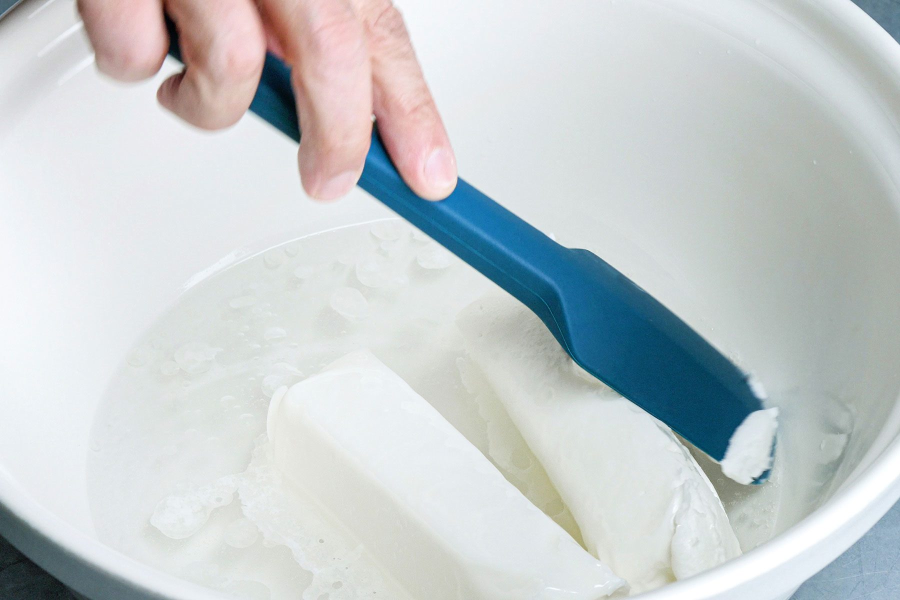 Stirring shortening in boiling water