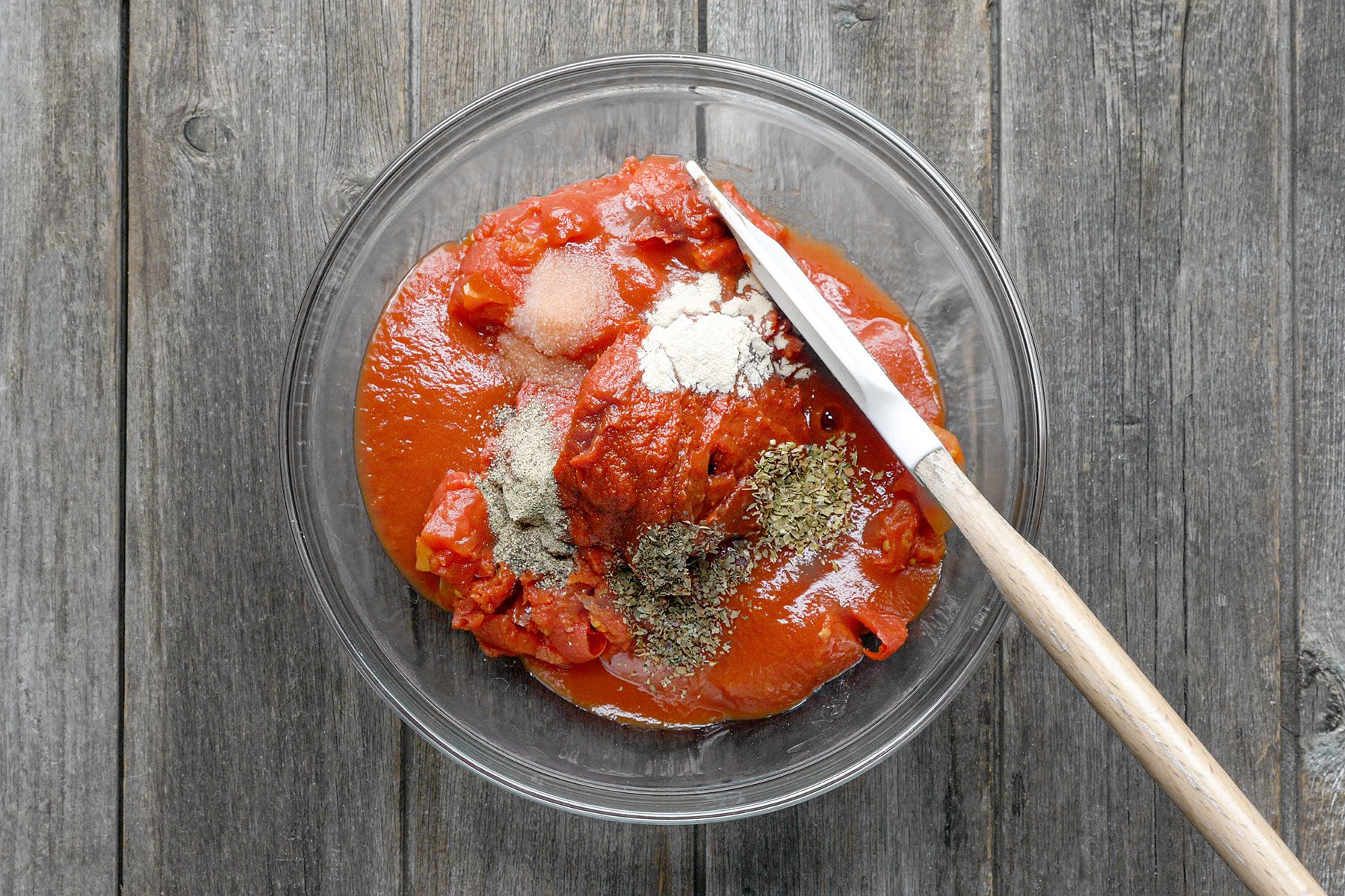 Preparing the sauce in a large bowl