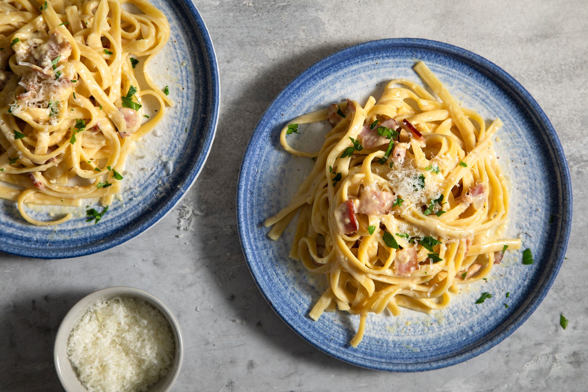 Delicious Fettuccine Carbonara with bacon, eggs, and Romano cheese
