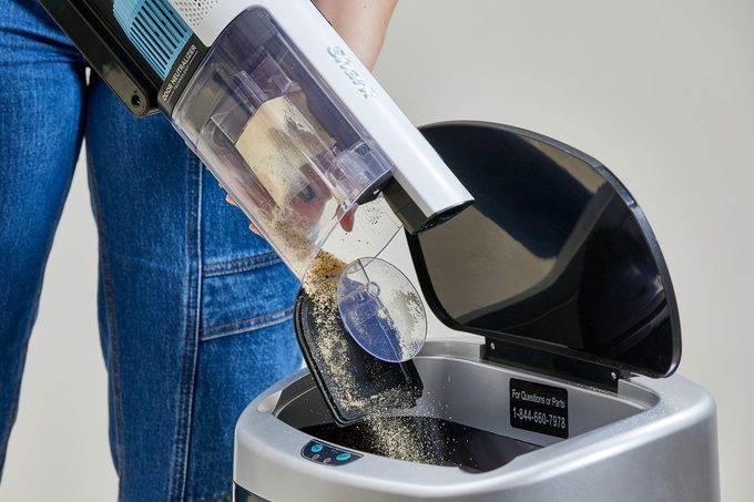 shark vs dyson ease of emptying cannisters