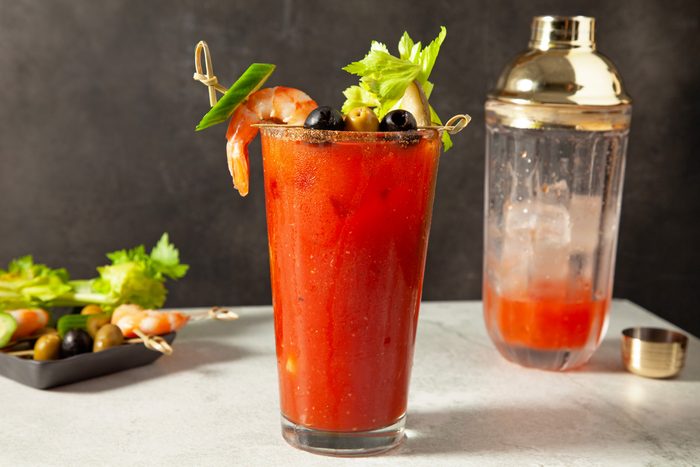 A bloody mary drink in a glass