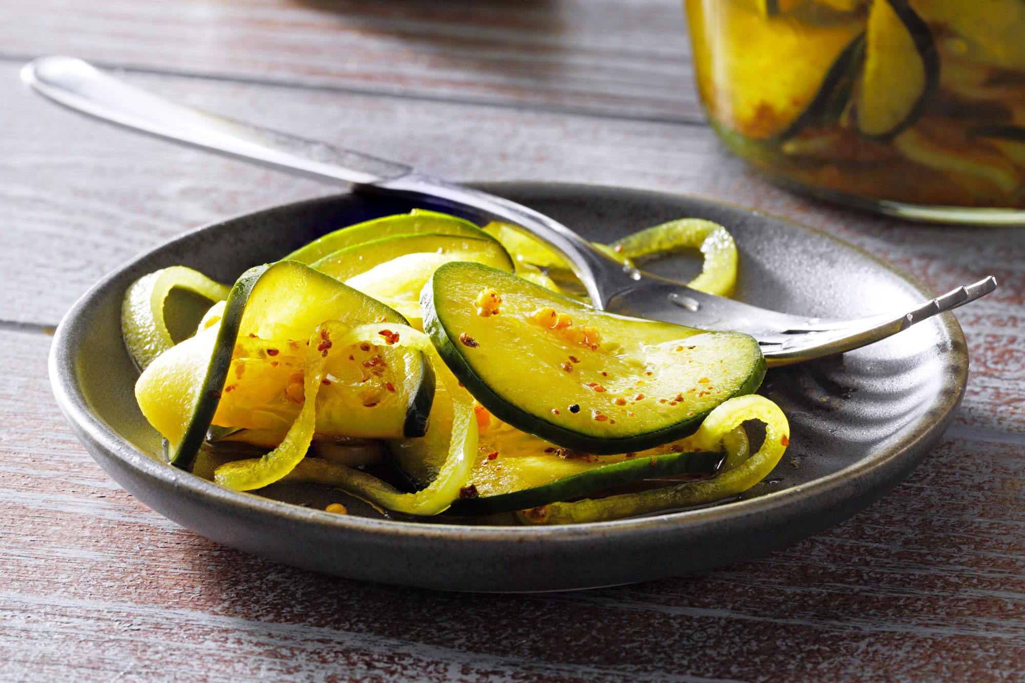 close shot of pickles on a plate