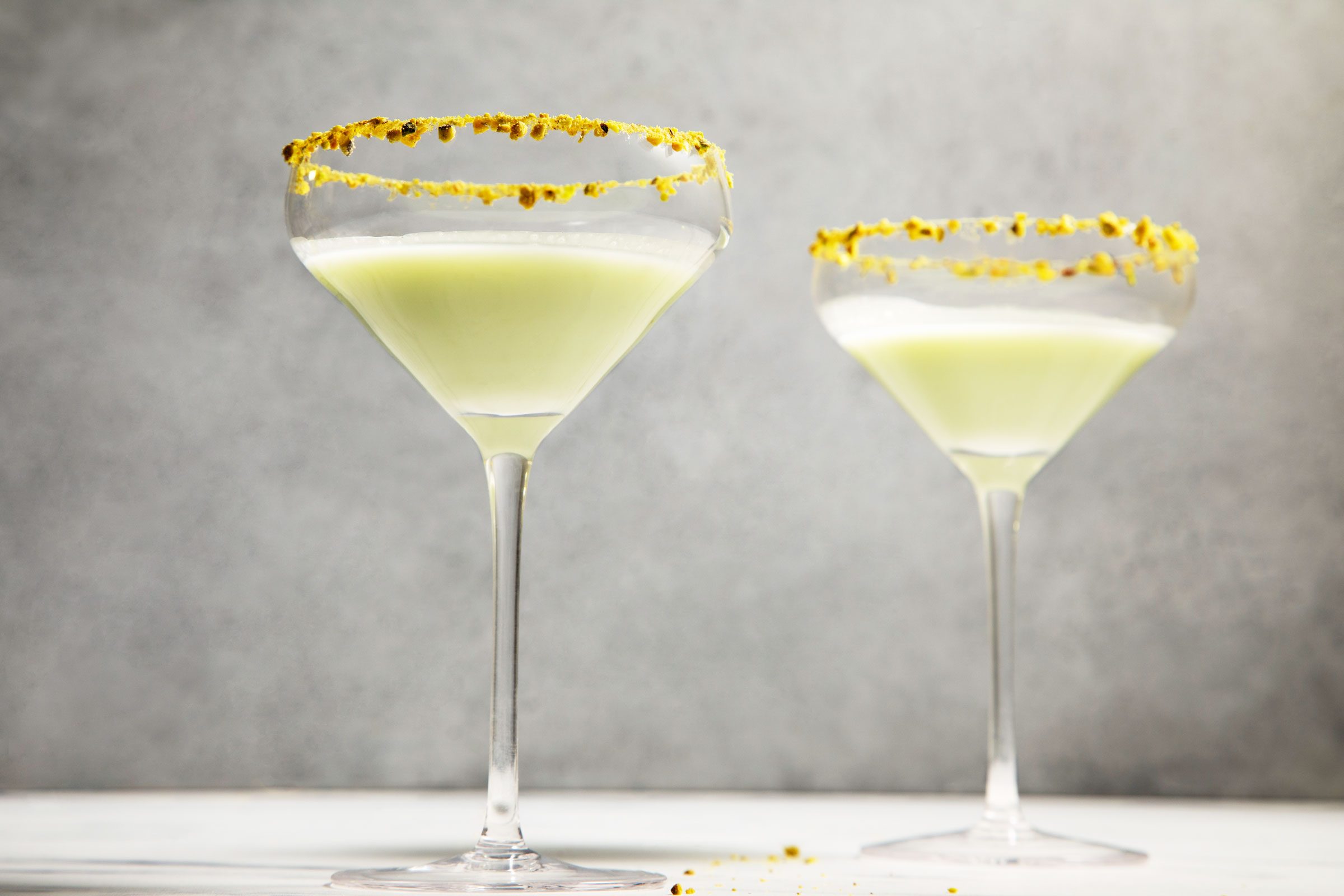 two Pistachio Martini served in glasses with a decorated rim