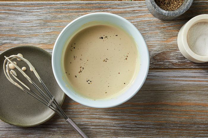 whisking Liquid mixture for salad