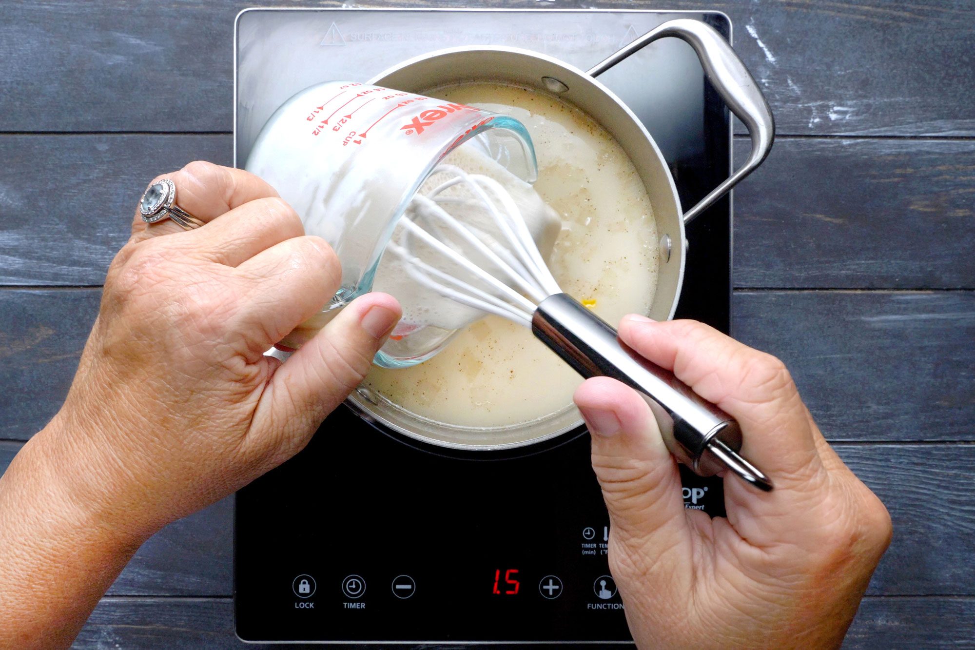 Stir in the corn, cup milk, salt and pepper