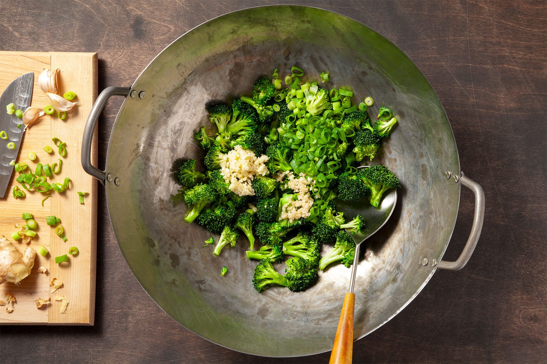 Stir frying vegetables in wok