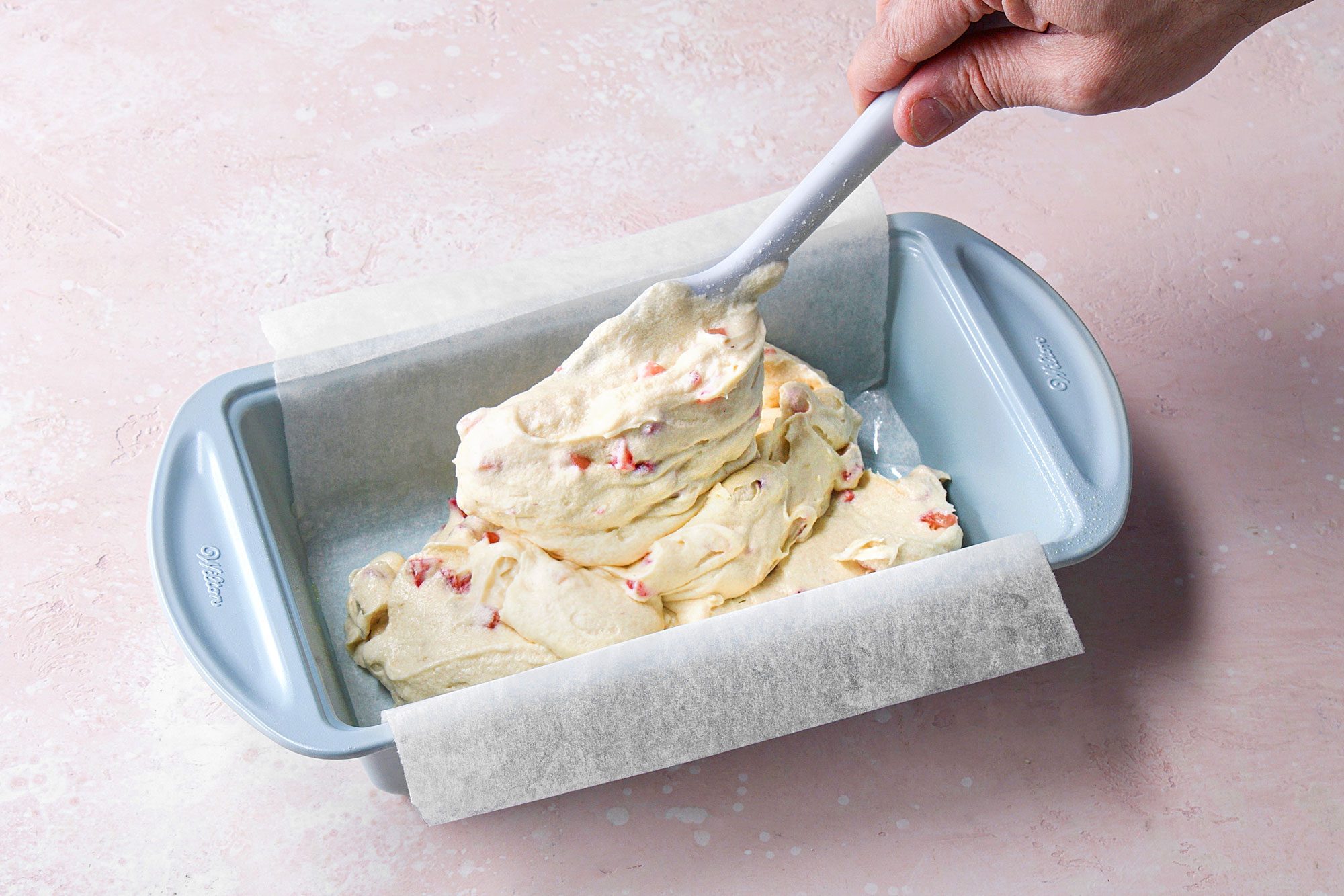 Transfer the batter to the prepared loaf pan