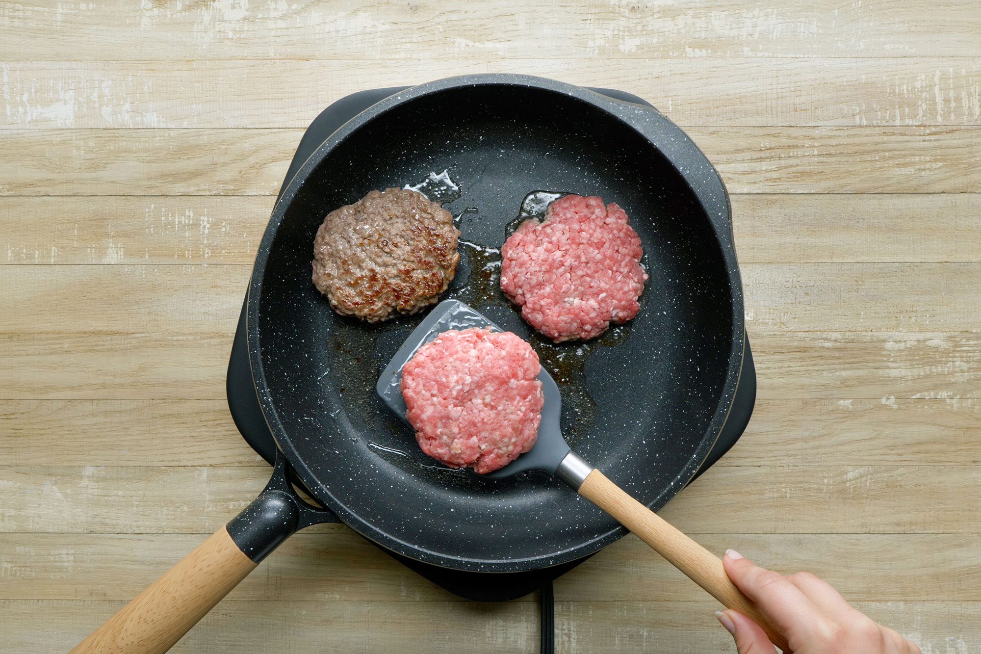 Cook the burgers over medium heat in a large non-stick skillet