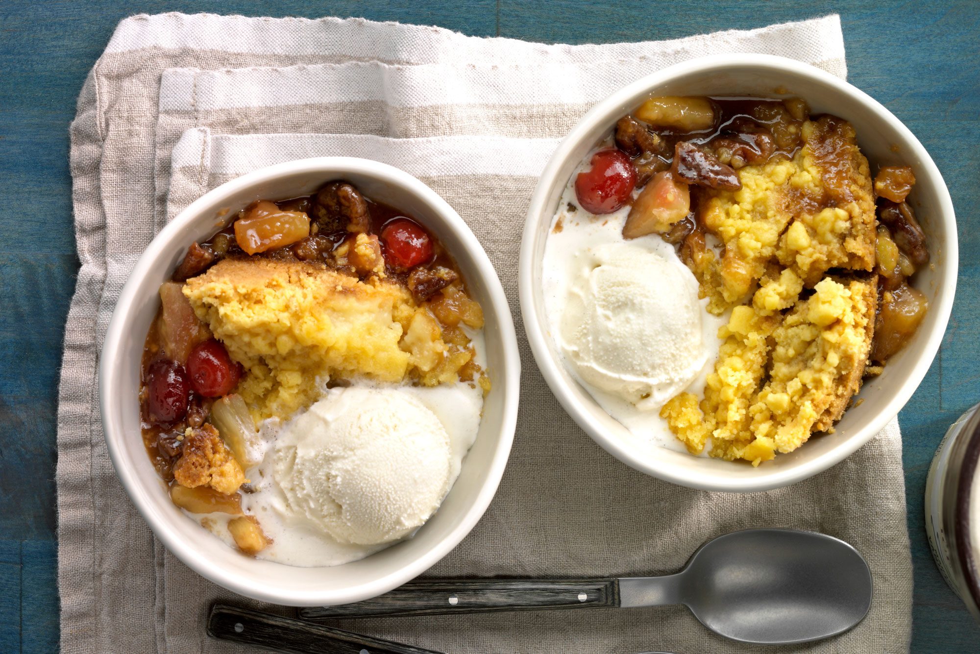 Slow Cooker Dump Cake served in two bowl with spoon