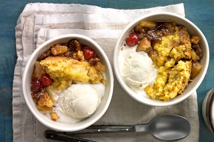 Slow Cooker Dump Cake served in two bowl with spoon