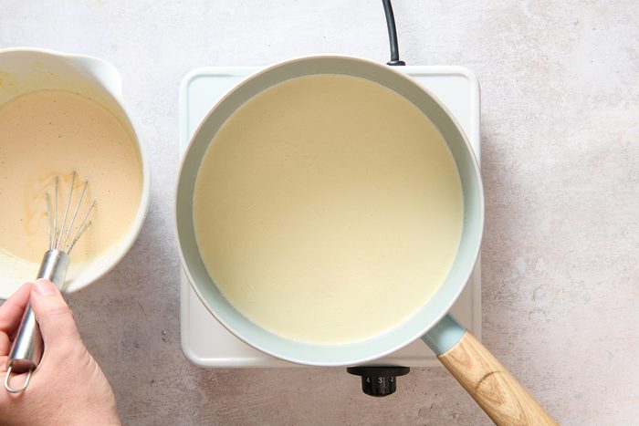 Heating pudding ingredients in a saucepan