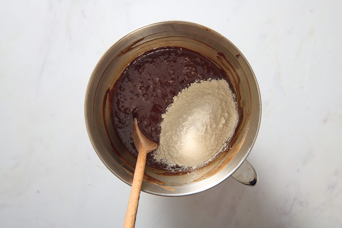Overhead shot of brownie batter being mixed in a bowl