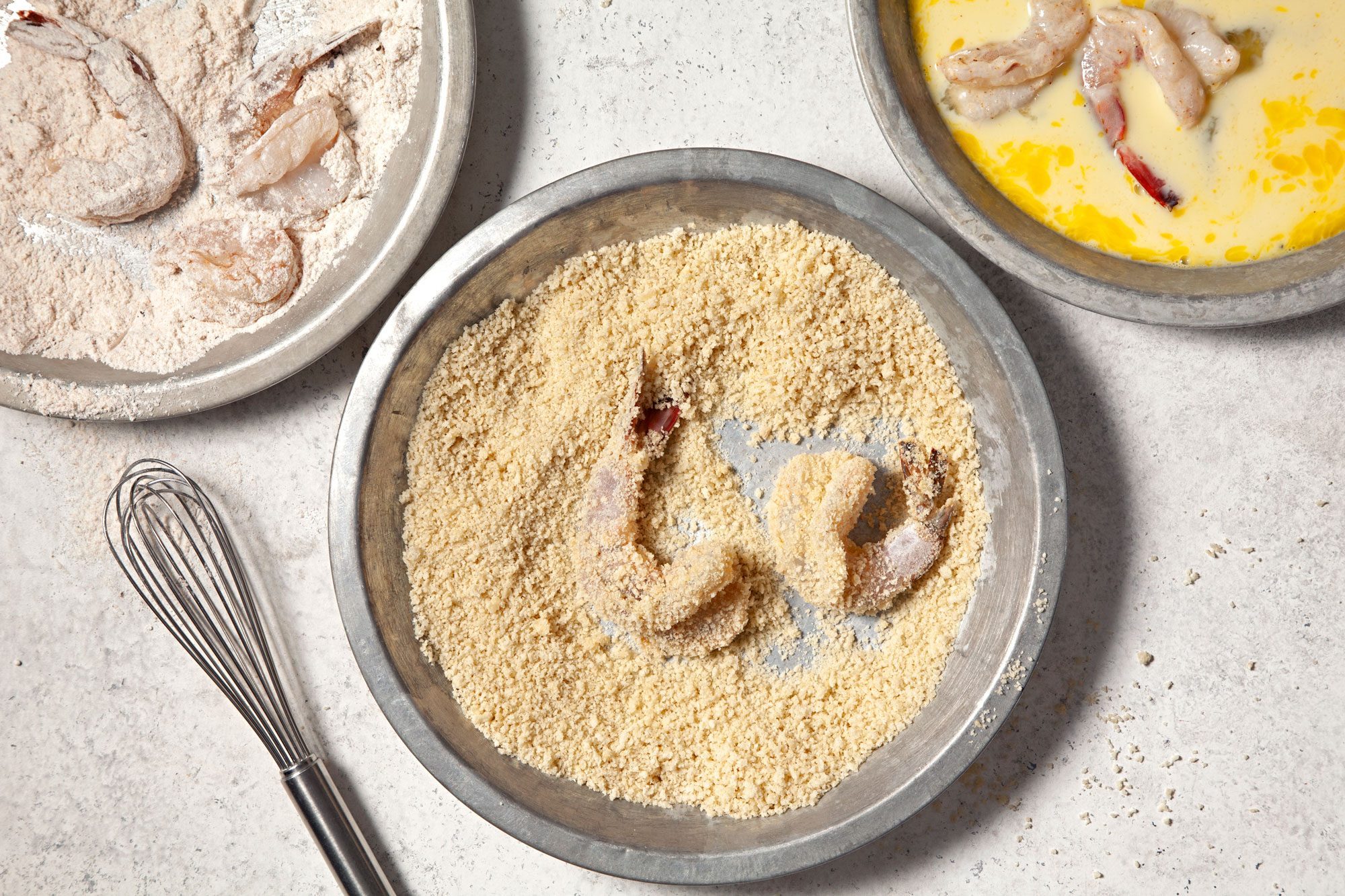 Dip shrimp in flour to coat both sides