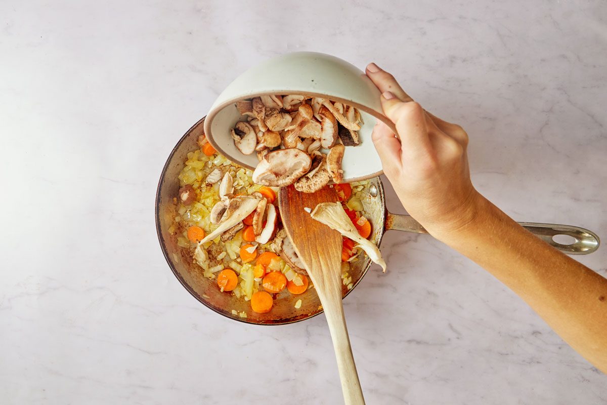 sautéing veggies in a skillet