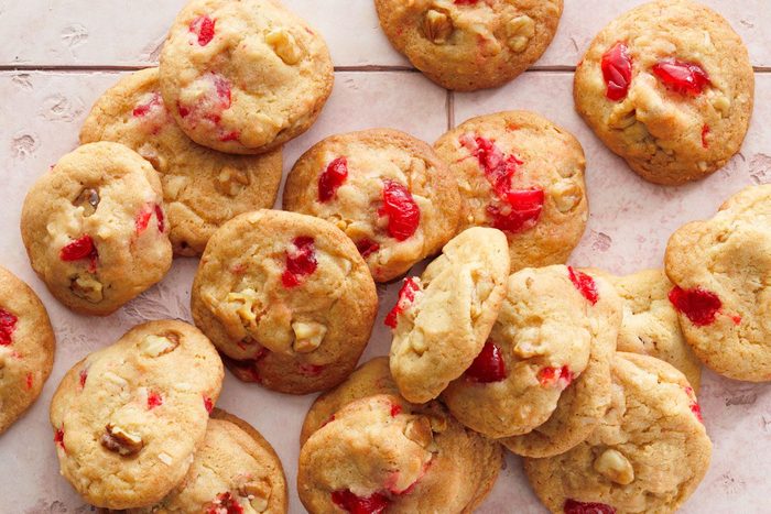 Top view of Cherry Cookies on a pink tile background