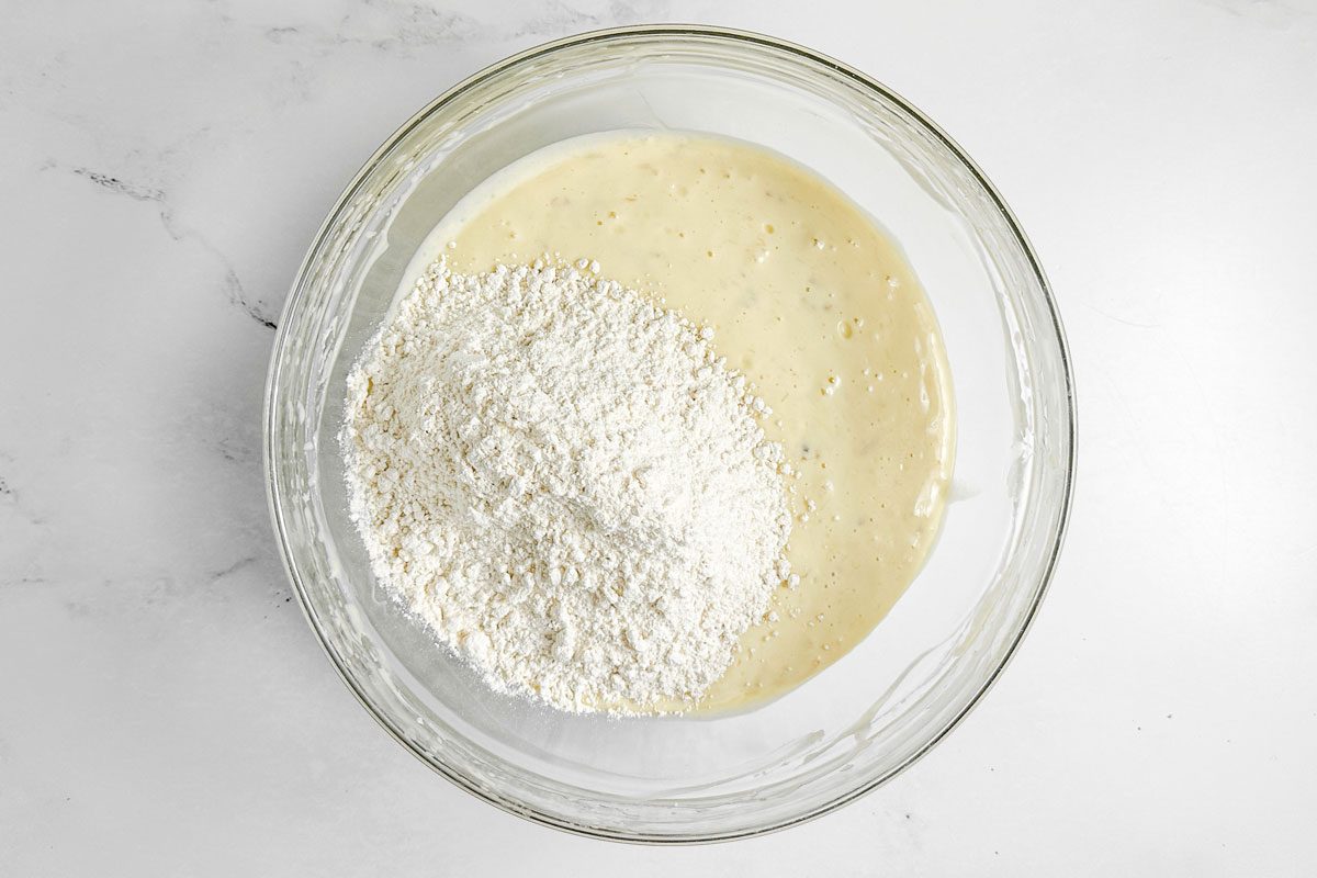 Batter for Taste of Home Banana Coffee Cake in a glass bowl on a marble surface