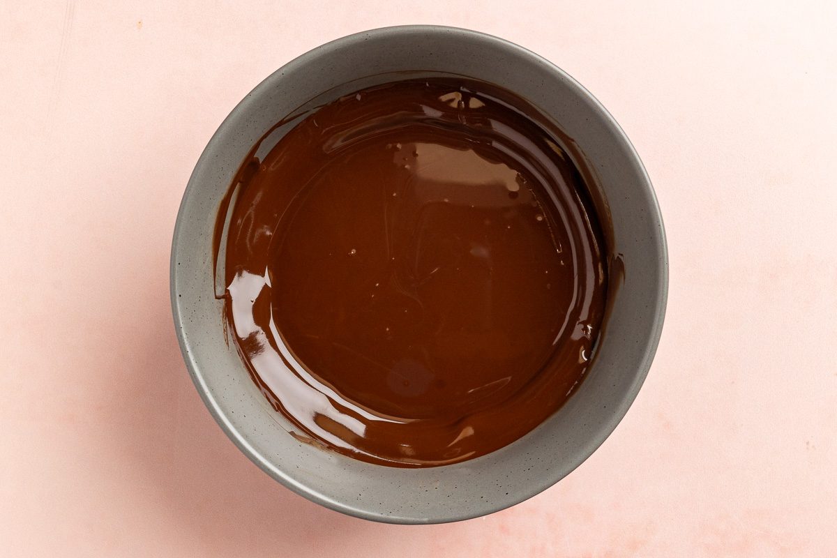 Taste of Home Cheesecake Bites recipe photo of the melted chocolate and shortening.