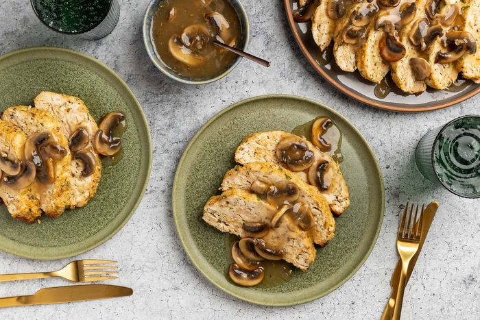 Taste of Home Chicken Loaf recipe photo of the finished recipe sliced and served on plates.