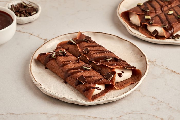 Chocolate crepes recipe by Taste of Home with cream filling.
