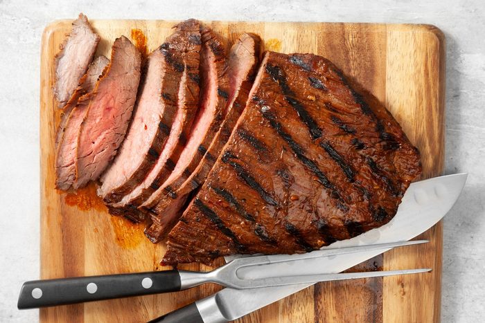 Thinly slice steak across the grain