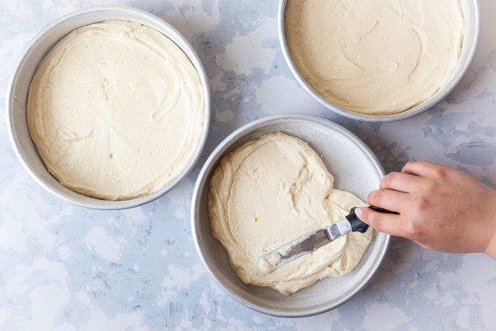 Step 2 of Taste of Home Italian Lemon Cream Cake is to Transfer to three greased and floured 8-in. round baking pans. Bake at 350°F for 14 to 18 minutes or until a toothpick inserted in the center comes out clean