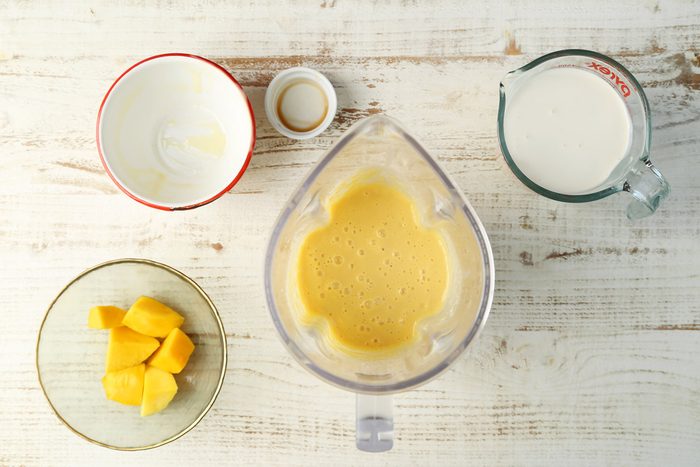 A how to image on how to mkae Taste of Home's no-churn Mango Ice Cream recipe.