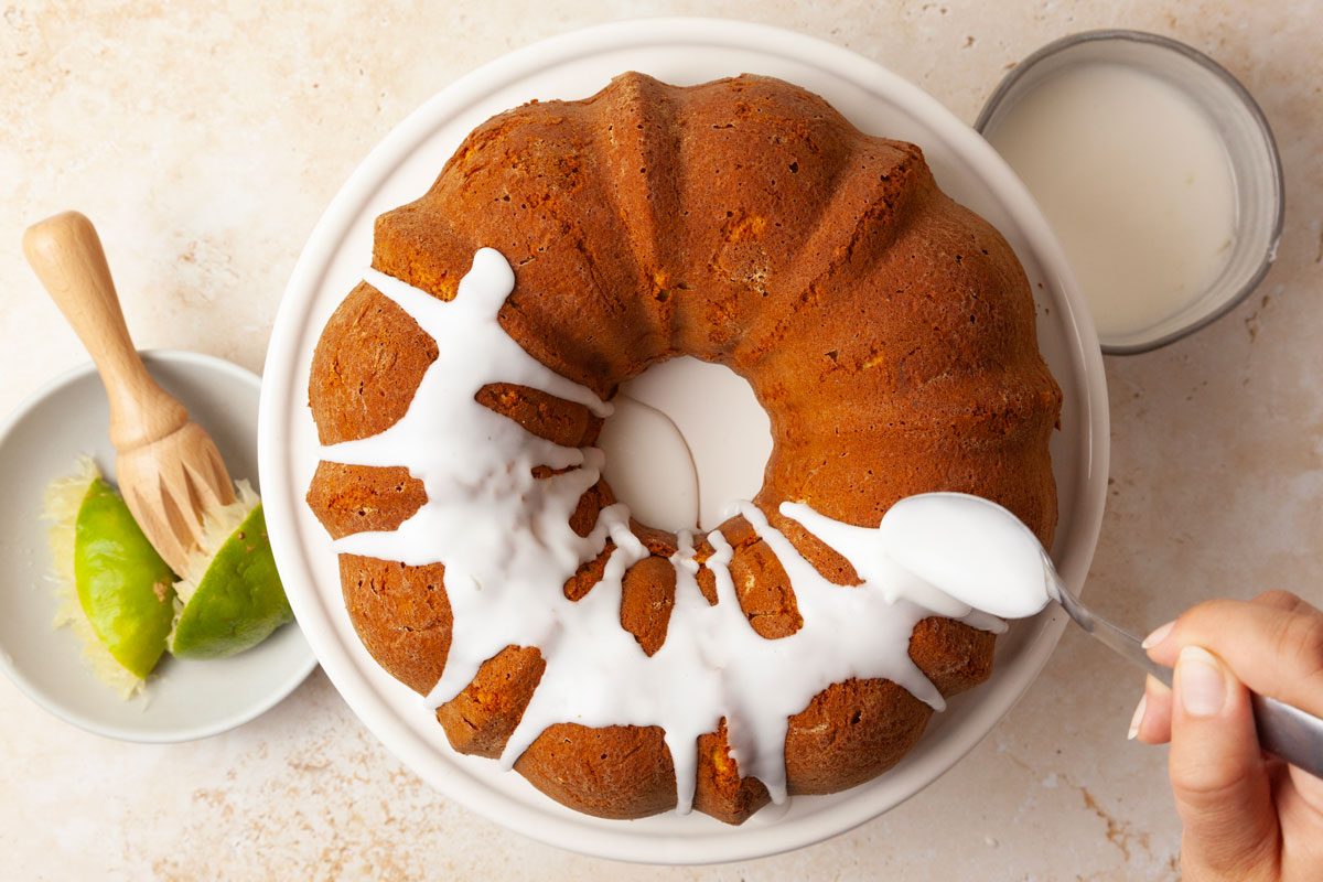 Step 3 of Taste of Home Margarita Cake is to combine the glaze ingredients and whisk until smooth. Once the cake is completely cool, drizzle the glaze over the top, letting it drip down the sides. Allow the glaze to set before slicing and serving.