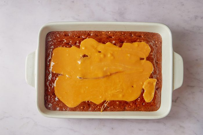 Add the caramel to the semi baked layer.