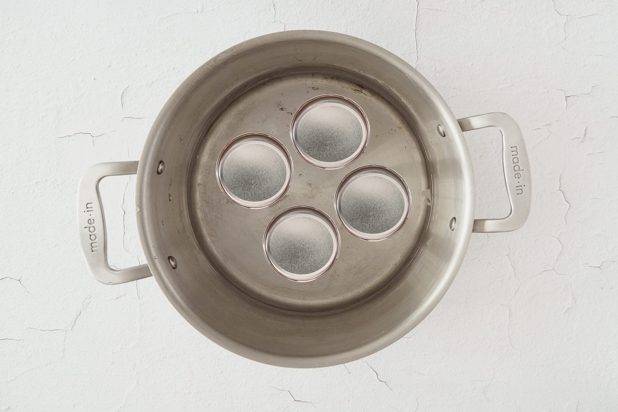Simmer the jars of strawberry rhubarb jam and cool.