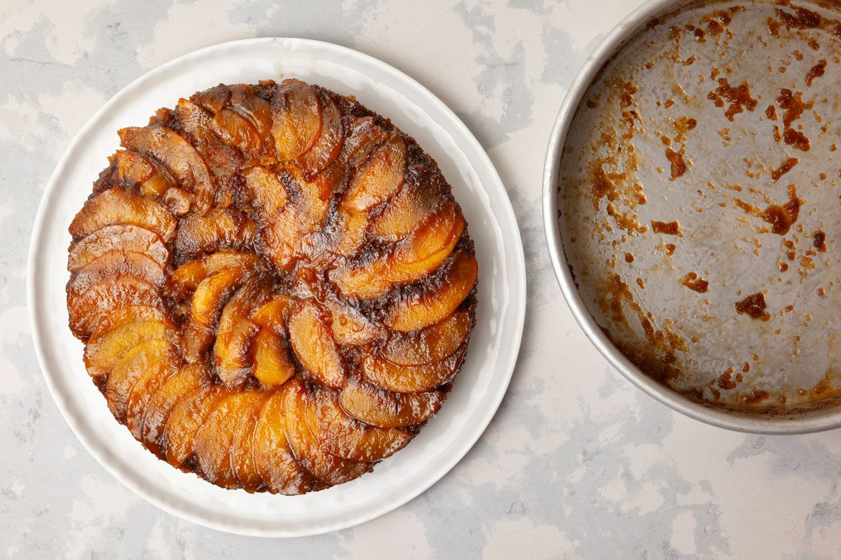 Step 3 of Taste of Home Peach Upside-Down Cake is to Bake the cake until a toothpick inserted in the center comes out clean, 45 to 50 minutes. Let the cake cool in the pan for 10 minutes before inverting it onto a serving plate
