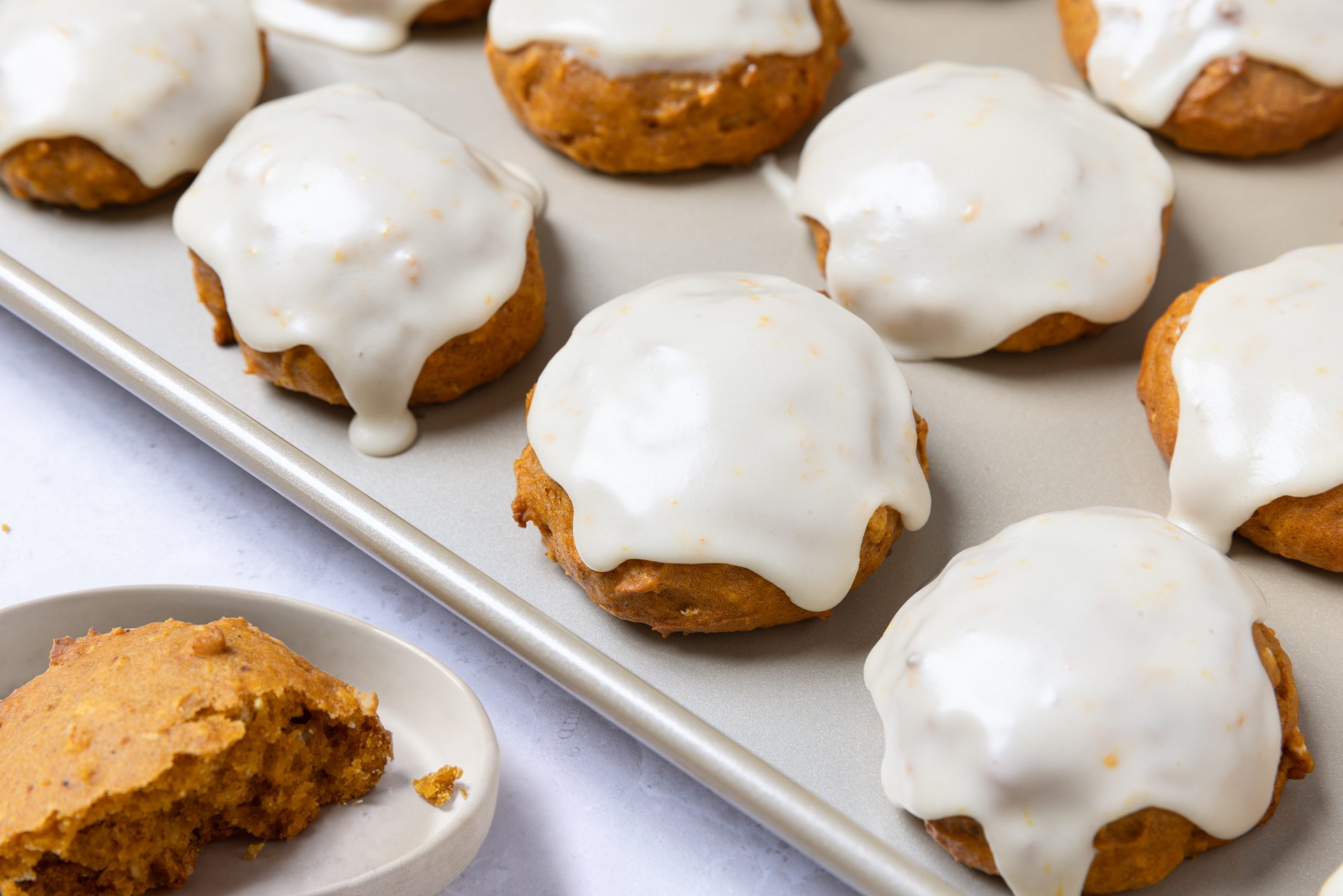 Cookies ready and frosted on baking sheet.