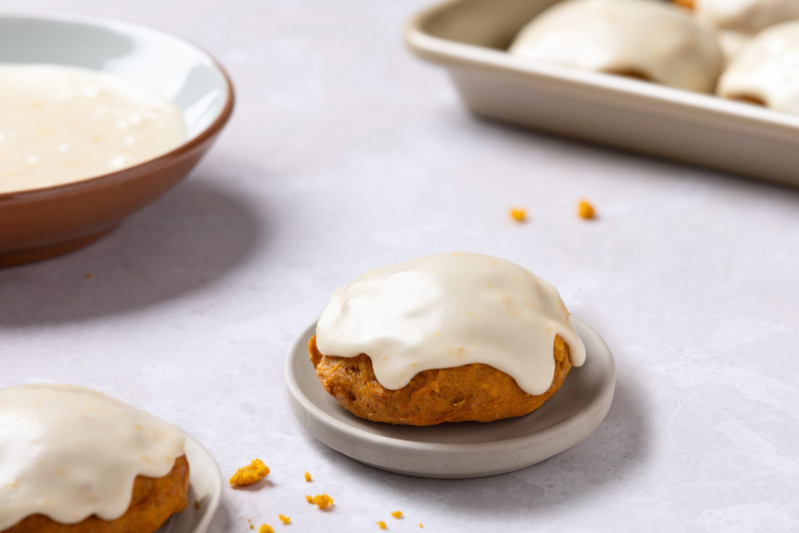 Cookies placed in small plates with baking sheet in the background.