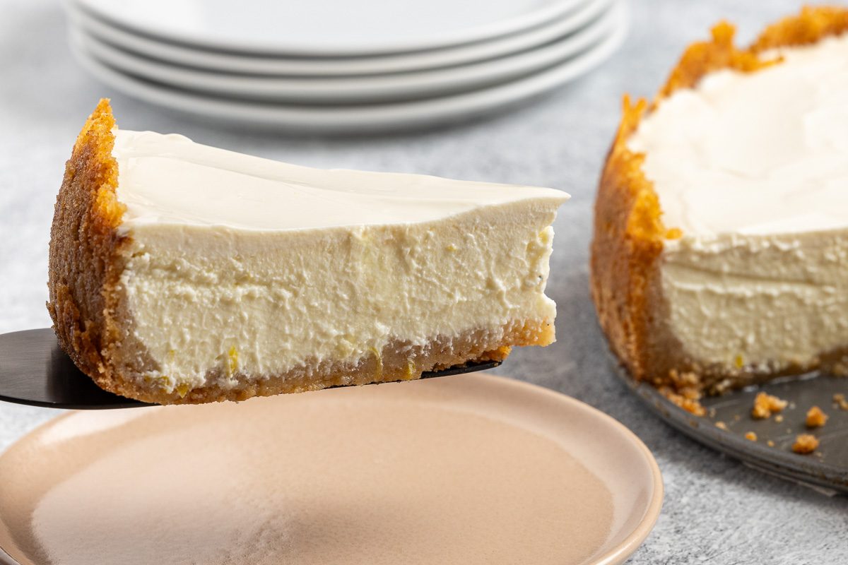 Taste of Home Ricotta Cheesecake recipe photo a slice of the cheesecake on a plate.