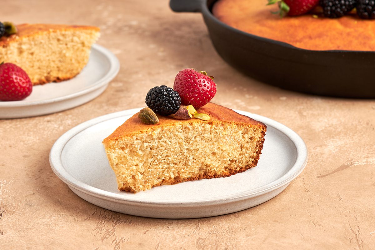 Serve this sweet, moist honey cake by Taste of Home with ripe berries and a sprinkle of crunchy pistachios.