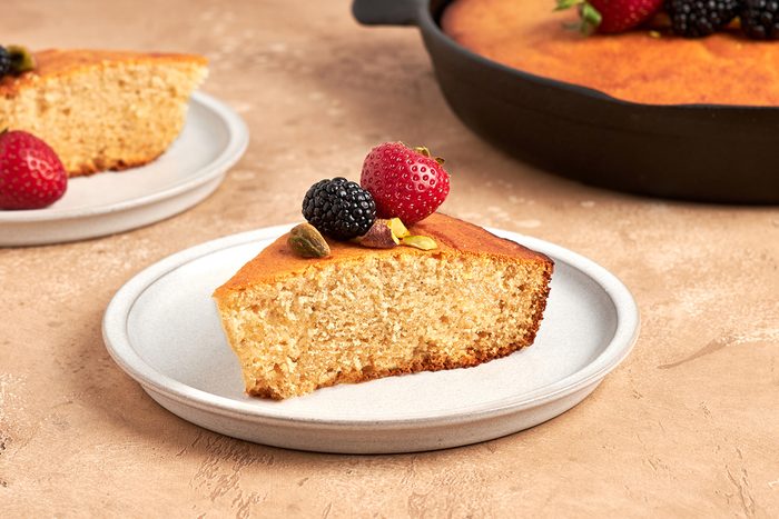 Serve this sweet, moist honey cake by Taste of Home with ripe berries and a sprinkle of crunchy pistachios.