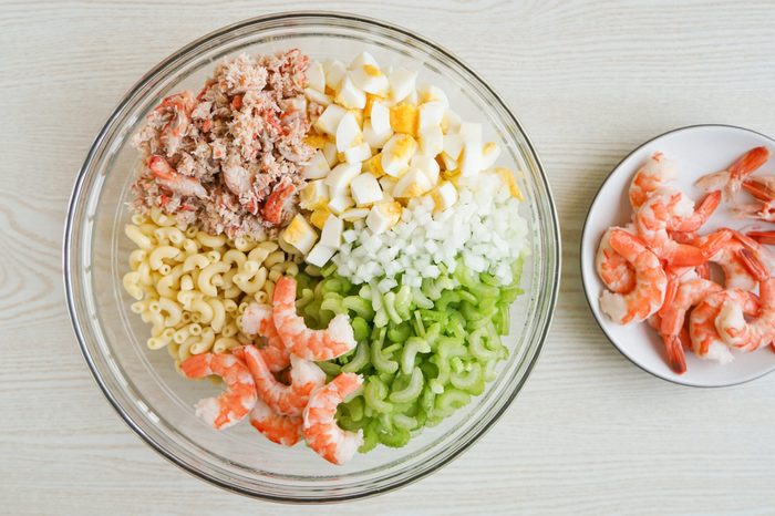 Prepping shrimp for seafood pasta salad