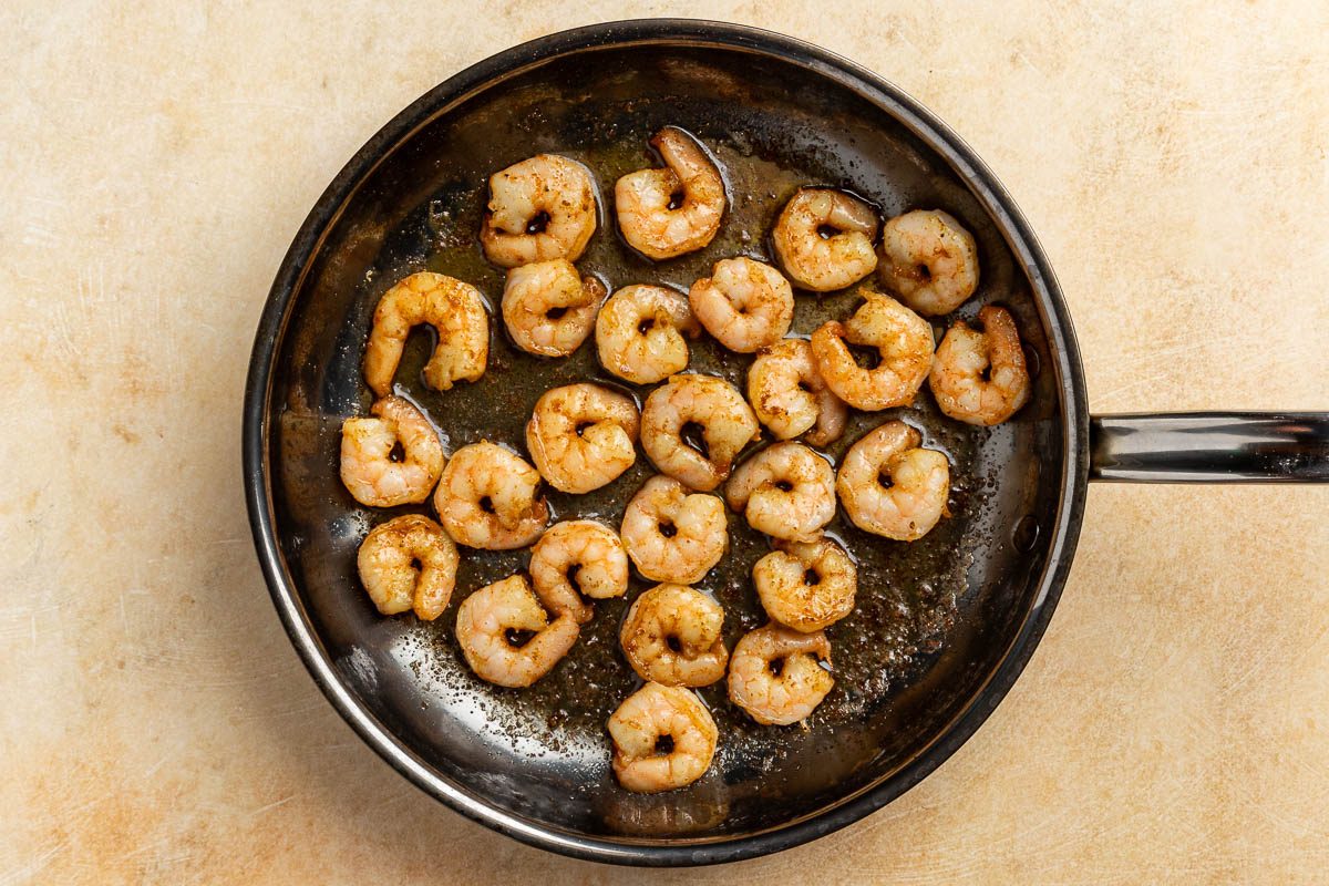 Taste of Home Shrimp Louie recipe photo of the shrimp sauteeed in a skillet.