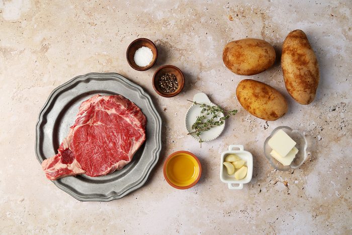 Ingredients laid out in bowls for Taste of Home's Steak Frites recipe.