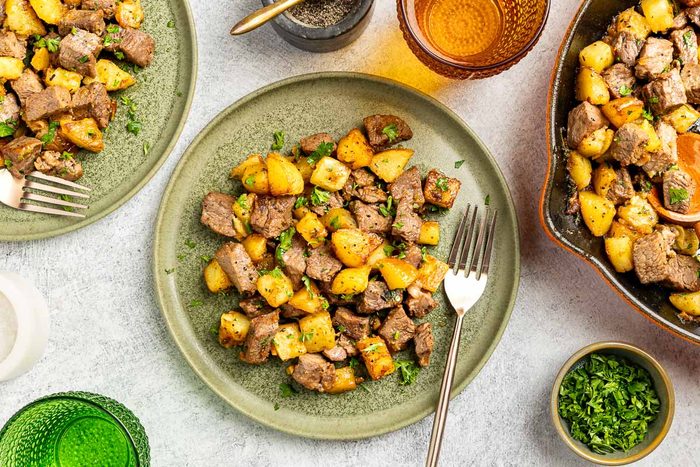 Taste of Home Steak and Potatoes recipe photo of the finished recipe served on plates.